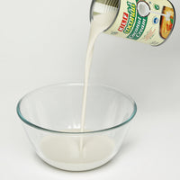 KLF Coconad Coconut Cream (22% coconut fat) — product being poured
